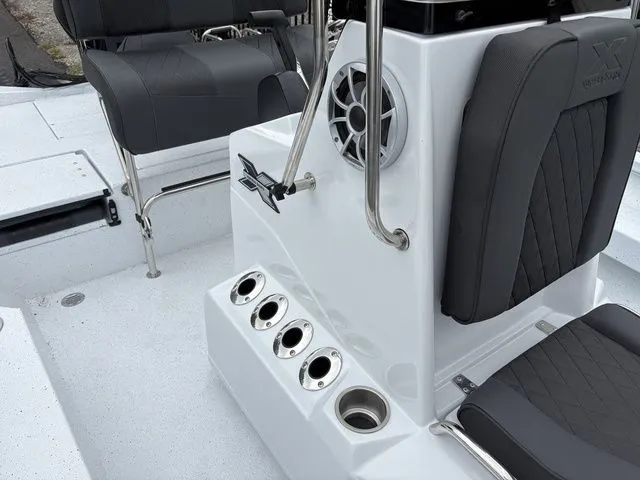 Slide: The Image of Interior of a 2026 Xpress Boats H20B with seat and speaker. - 11