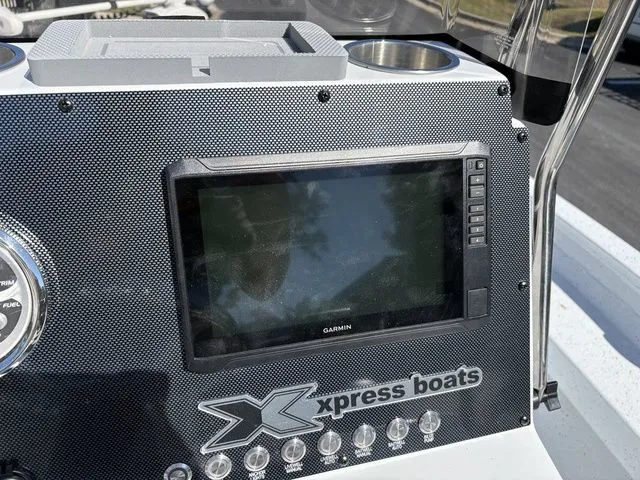 Slide: The Image of 2026 Xpress Boats H20B with Garmin navigation system. - 13