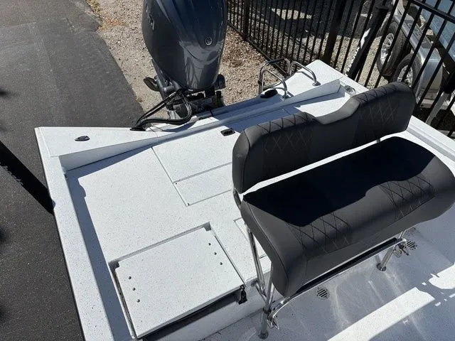 Slide: The Image of 2026 Xpress Boats H20B with black seating and motor. - 14