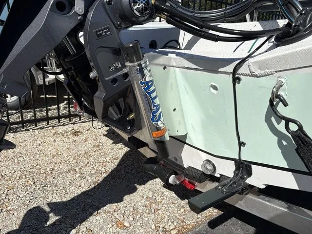 Slide: The Image of Rear view of 2026 Xpress Boats H20B with Atlas hydraulic system. - 17