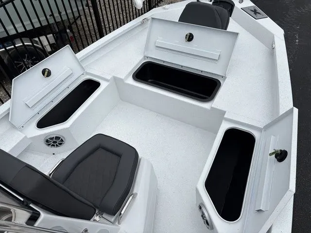 Slide: The Image of Interior view of 2026 Xpress Boats H20B with open storage compartments. - 6