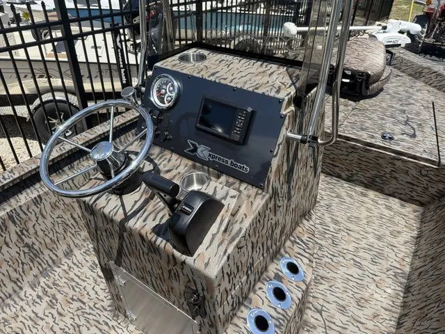 Slide: The Image of 2026 Xpress Boats H190B with modern cockpit design. - 15