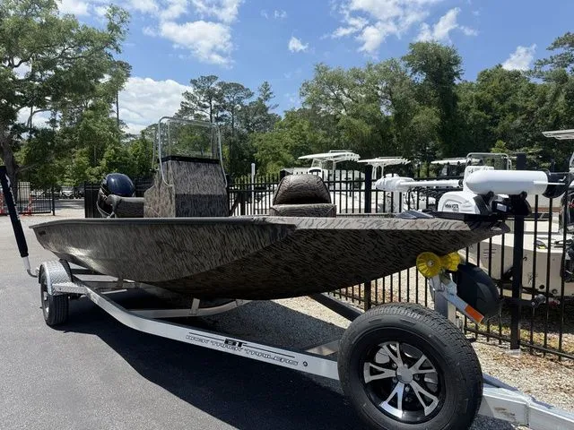 Slide: The Image of 2026 Xpress Boats H190B on trailer, parked outdoors. - 3