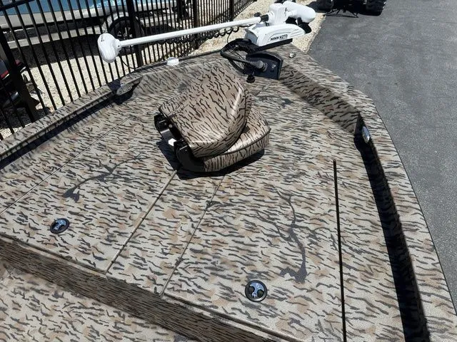 Slide: The Image of 2026 Xpress Boats H190B with camouflage-patterned deck. - 7
