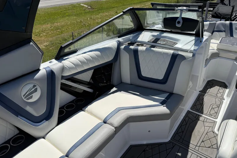 Slide: The Image of 2022 Tigé 21ZX boat interior with luxurious seating and modern design. - 10