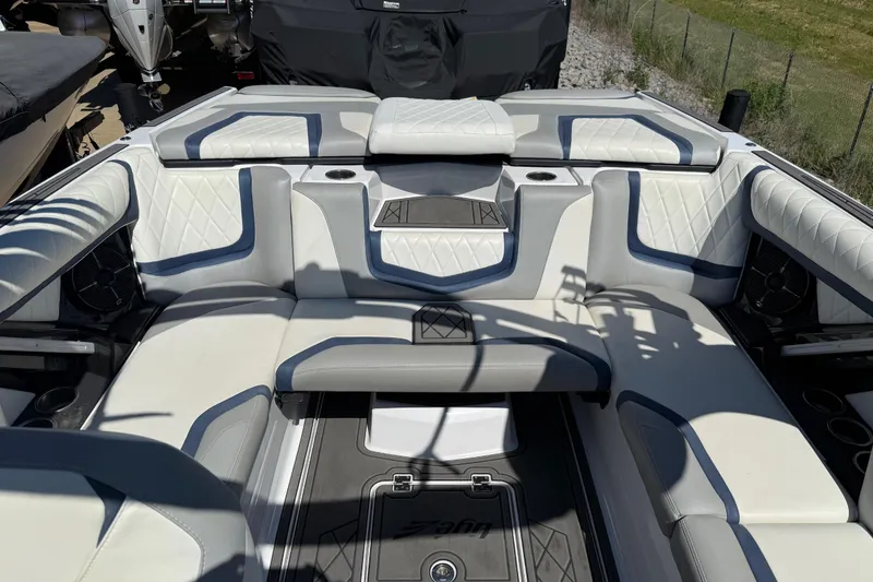 Slide: The Image of 2022 Tigé 21ZX boat interior with luxurious seating and modern design. - 17