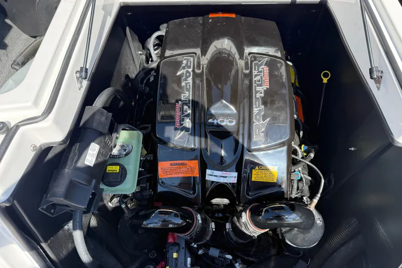Slide: The Image of 2022 Tigé 21ZX boat engine, featuring a powerful Raptor 400 motor. - 25