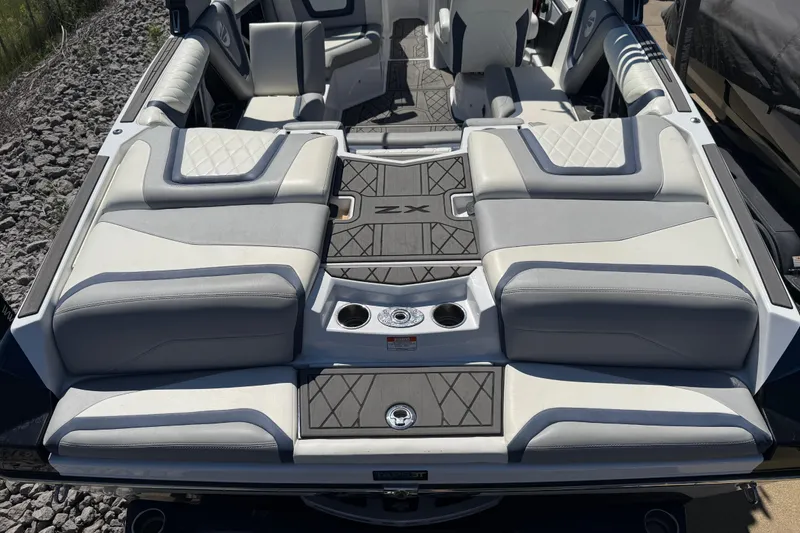 Slide: The Image of 2022 Tigé 21ZX boat interior with luxurious seating and modern design. - 28