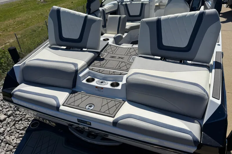 Slide: The Image of 2022 Tigé 21ZX boat interior with stylish seating and modern design. - 29