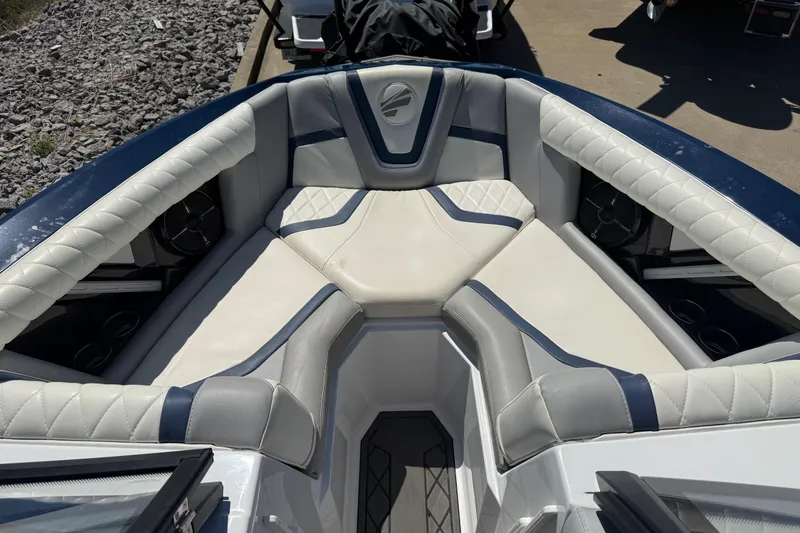 Slide: The Image of 2022 Tigé 21ZX boat interior with luxurious seating and modern design. - 5