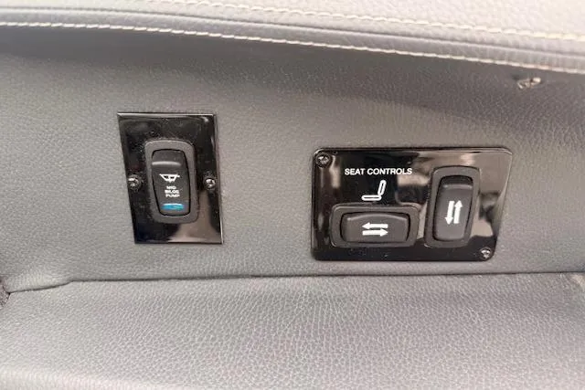 Slide: The Image of Seat controls on 2021 Regal 2800 Bowrider boat, featuring adjustable seating options. - 16