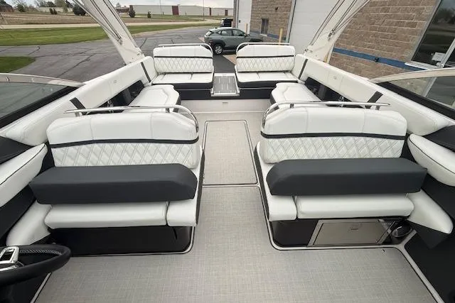 Slide: The Image of 2021 Regal 2800 Bowrider interior with luxurious white seating and spacious layout. - 24