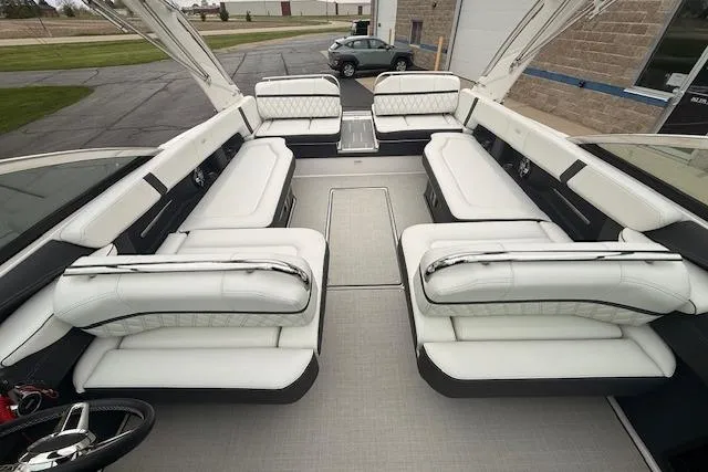 Slide: The Image of 2021 Regal 2800 Bowrider interior with luxurious white seating and spacious layout. - 26