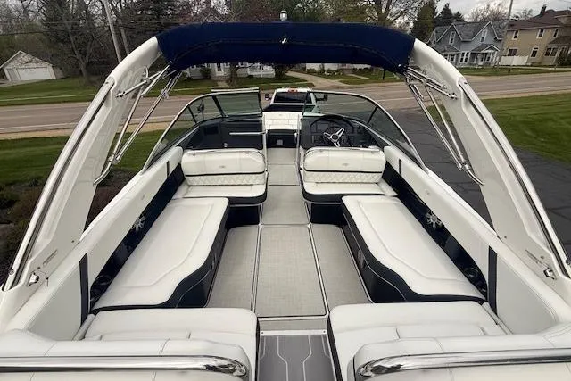 Slide: The Image of 2021 Regal 2800 Bowrider boat with spacious seating and sleek design. - 3