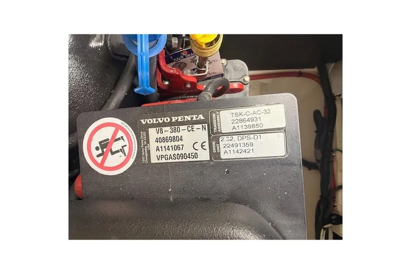 Slide: The Image of Volvo Penta engine label on 2021 Regal 2800 Bowrider, displaying model and serial numbers. - 35
