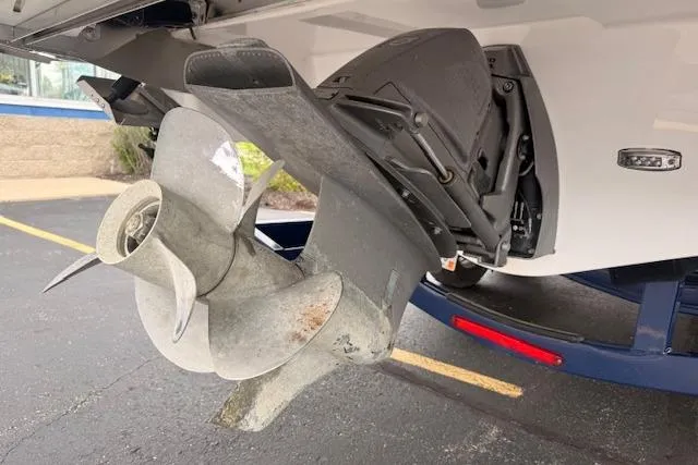 Slide: The Image of Propeller of a 2021 Regal 2800 Bowrider boat on a trailer. - 41