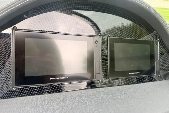 Slide: The Image of Dashboard of a 2021 Regal 2800 Bowrider featuring Volvo Penta displays. - 9