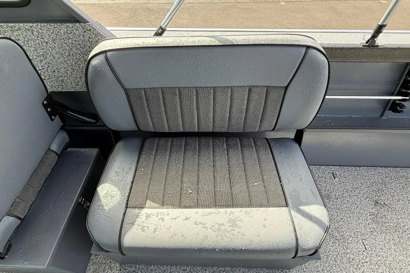 Slide: The Image of 2026 Alumaweld Stryker X202 boat seat with water droplets, showcasing durable upholstery. - 12