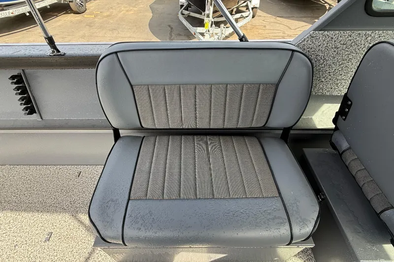 Slide: The Image of 2026 Alumaweld Stryker X202 boat seat with gray upholstery and textured design. - 14