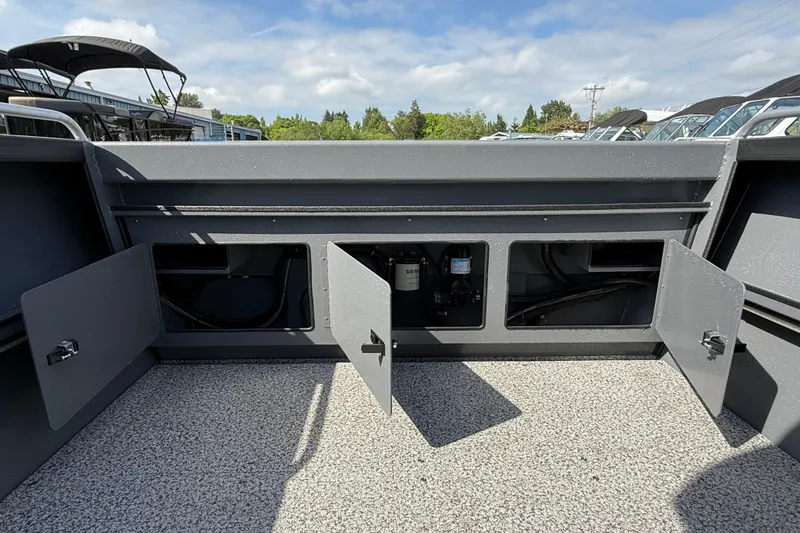 Slide: The Image of 2026 Alumaweld Stryker X202 boat interior with open storage compartments. - 28