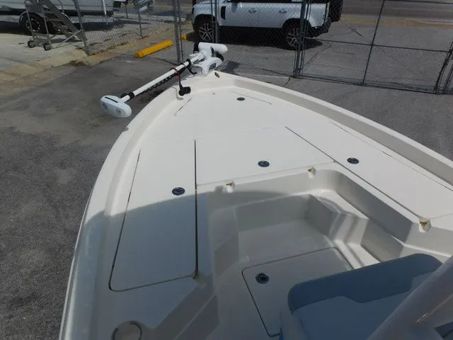 Slide: The Image of 2017 Skeeter SX210 boat bow with storage and motor. - 10
