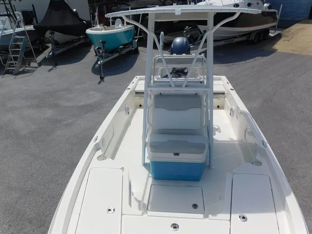 Slide: The Image of 2017 Skeeter SX210 boat with center console and seating. - 12