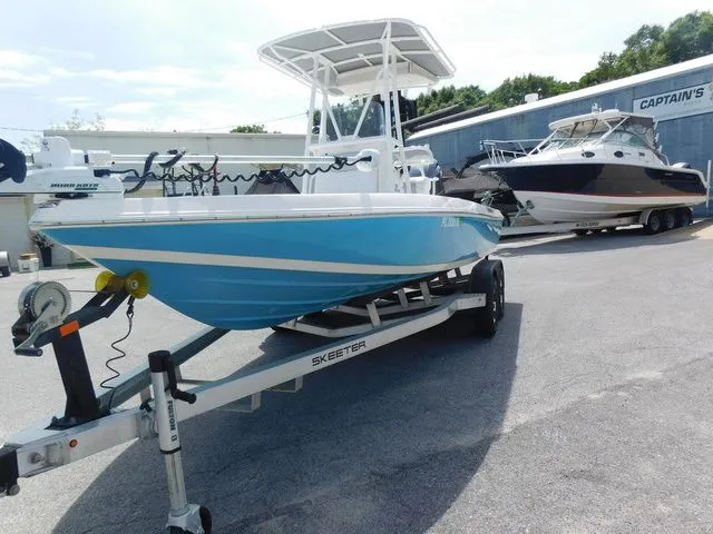 Slide: The Image of 2017 Skeeter SX210 boat on trailer parked outdoors. - 3