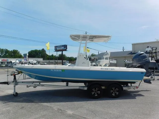 Slide: The Image of 2017 Skeeter SX210 boat on trailer outdoors. - 4