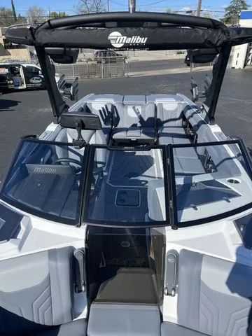 Slide: The Image of 2026 Malibu Wakesetter 25 LSV boat with sleek design. - 8