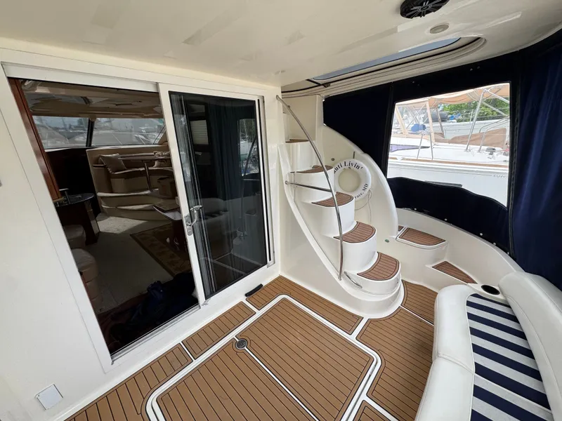 Slide: The Image of Interior of a 2008 Meridian 391 Sedan yacht with spiral staircase. - 11