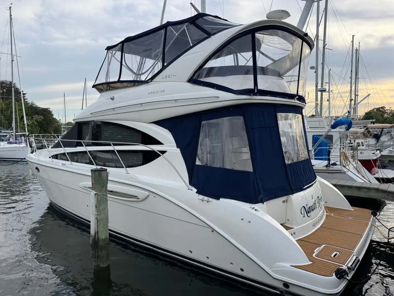 Slide: The Image of 2008 Meridian 391 Sedan yacht docked at marina. - 12