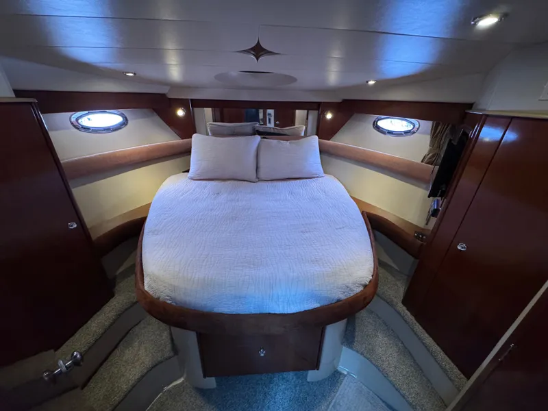 Slide: The Image of Interior of a 2008 Meridian 391 Sedan yacht with cozy bedroom. - 24