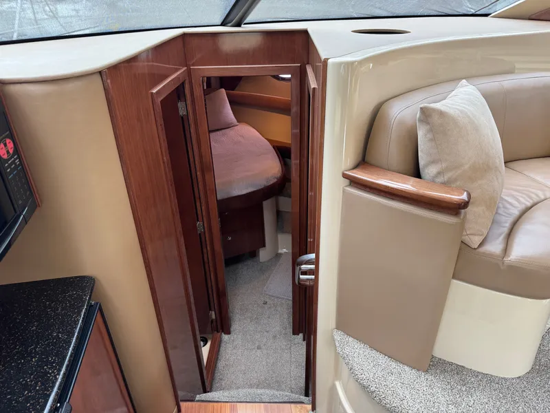 Slide: The Image of Interior of a 2008 Meridian 391 Sedan yacht with wooden doors. - 25