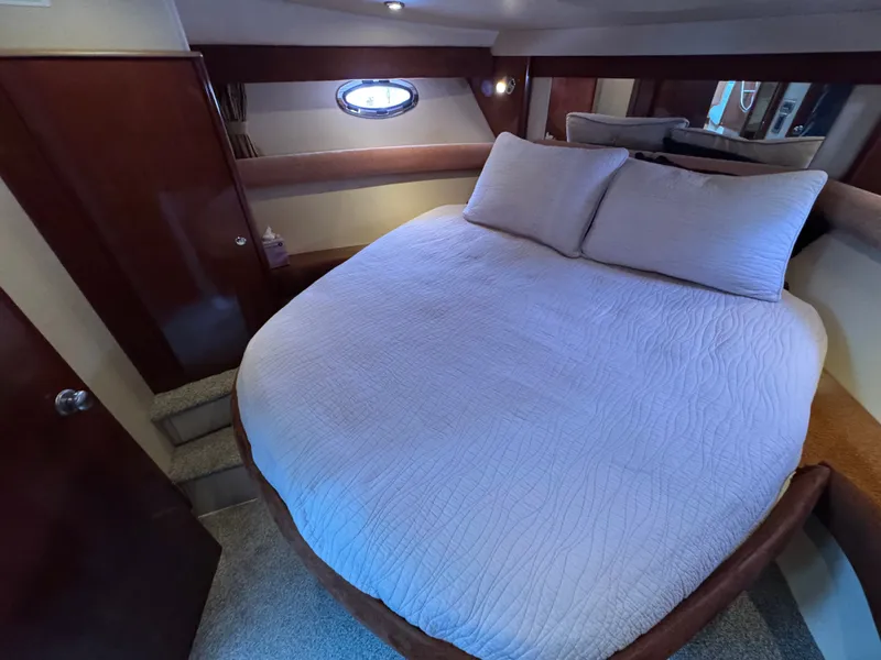 Slide: The Image of Interior of a 2008 Meridian 391 Sedan yacht with cozy bed. - 26