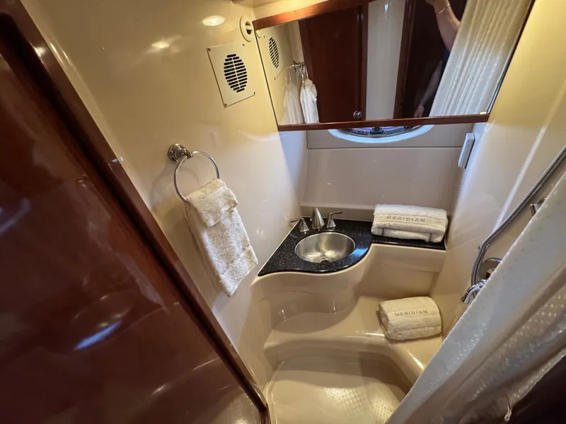 Slide: The Image of Luxurious bathroom in a 2008 Meridian 391 Sedan yacht. - 28