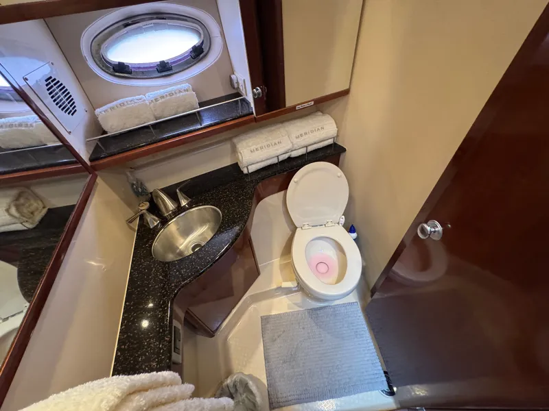 Slide: The Image of Luxurious bathroom in a 2008 Meridian 391 Sedan yacht. - 34