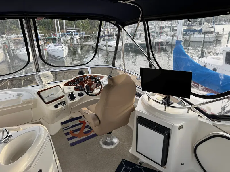 Slide: The Image of Interior of a 2008 Meridian 391 Sedan yacht with helm and electronics. - 44