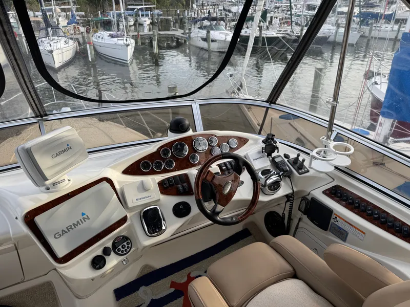 Slide: The Image of Helm of a 2008 Meridian 391 Sedan yacht in harbor. - 45