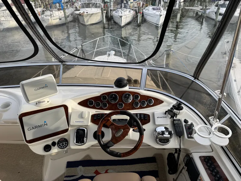 Slide: The Image of Interior view of 2008 Meridian 391 Sedan cockpit at marina. - 46