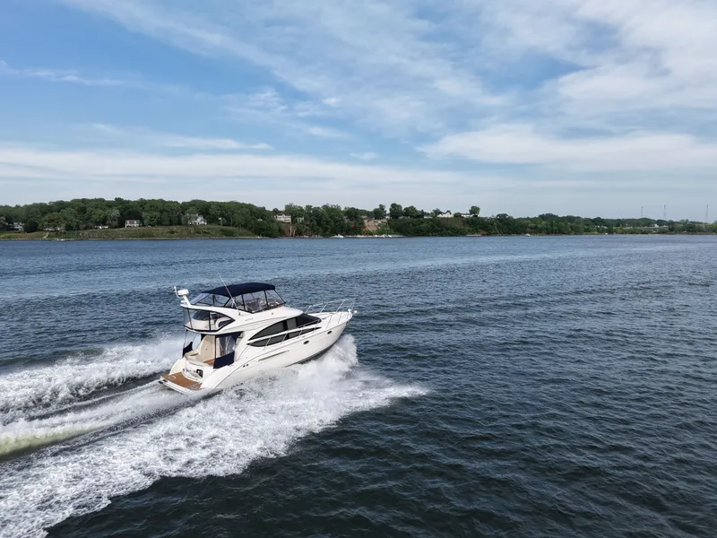 Slide: The Image of 2008 Meridian 391 Sedan Yacht on open water. - 8
