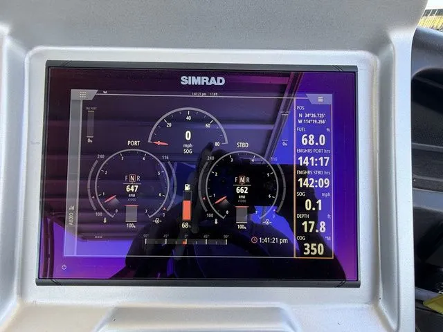 Slide: The Image of Simrad display on 2022 Premier Escalante 310 DL showing engine data. - 11