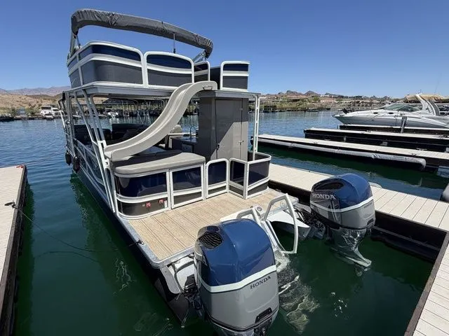 Slide: The Image of 2022 Premier Escalante 310 DL pontoon boat with slide and Honda engines. - 3