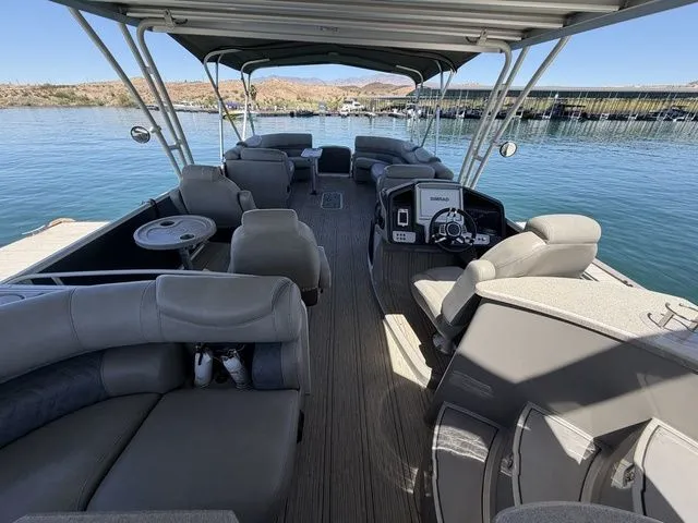 Slide: The Image of Interior view of a 2022 Premier Escalante 310 DL pontoon boat. - 5