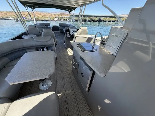 Slide: The Image of Interior of 2022 Premier Escalante 310 DL with seating and kitchenette. - 6