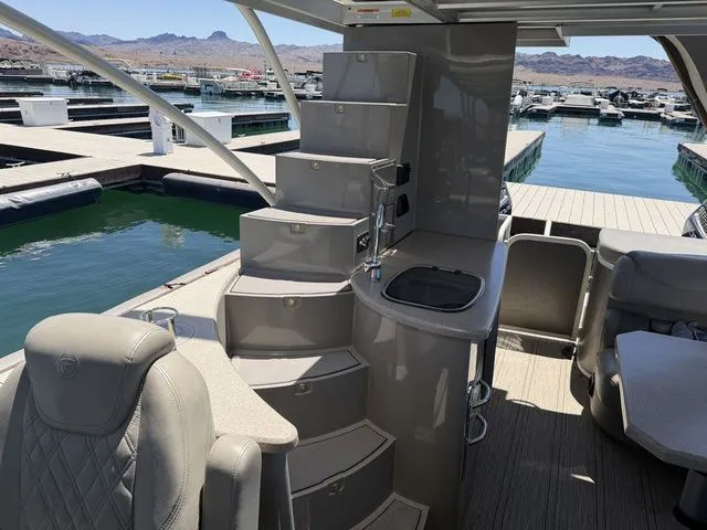 Slide: The Image of Interior of 2022 Premier Escalante 310 DL with stairs and marina view. - 8