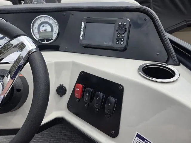 Slide: The Image of Dashboard of Crest Conquest SE 220 Cruise Tri-Toon 2026. - 24