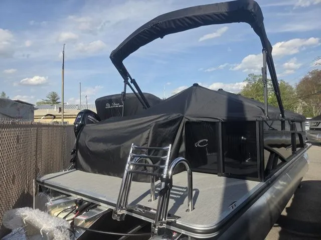 Slide: The Image of 2026 Crest Conquest SE 220 Cruise Tri-Toon with cover and trailer. - 5