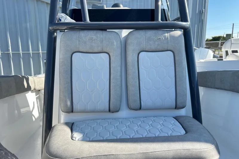 Slide: The Image of 2021 Sea Fox 228 Commander boat seating with gray and white upholstery. - 10