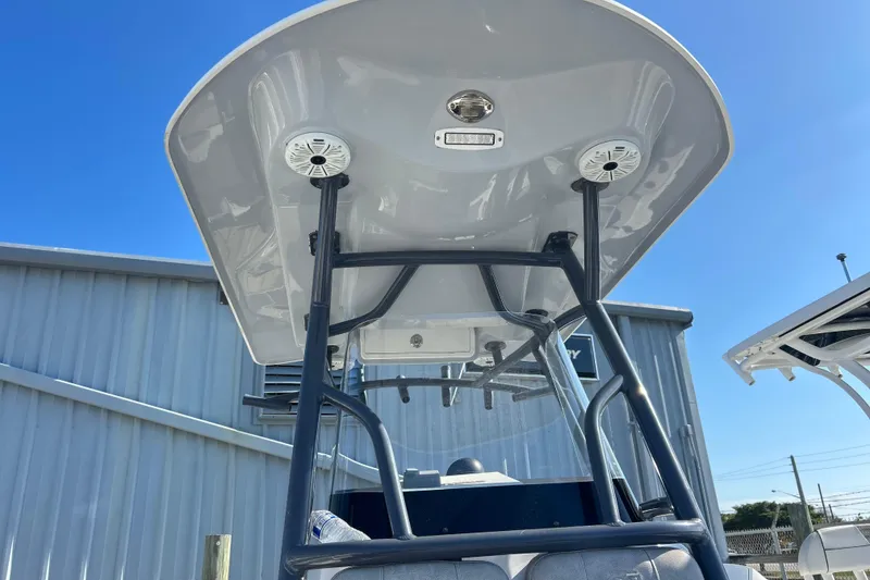 Slide: The Image of 2021 Sea Fox 228 Commander boat with T-top and speakers, viewed from below. - 11