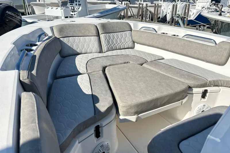 Slide: The Image of 2021 Sea Fox 228 Commander boat interior with gray cushioned seating. - 3